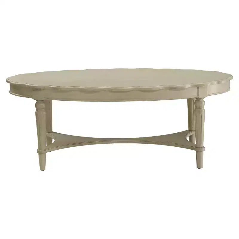 Table basse blanc cassé : Pieds en bois sculpté, finition antique, meuble de salon